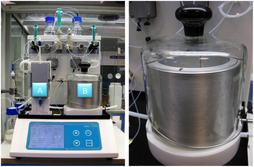 Tubes and pumps on control pad; spiralled tube cylinder reactor